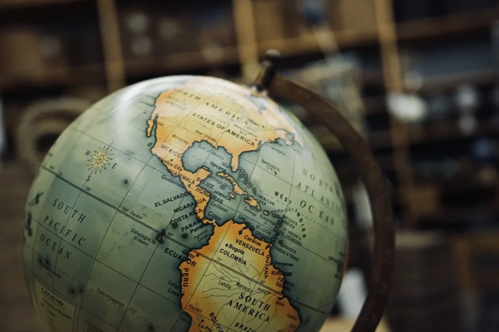 A globe displayed prominently in a store, showcasing various countries and continents in vibrant colors.